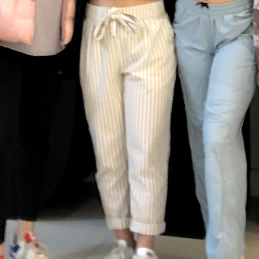 tan and white pinstripe pants